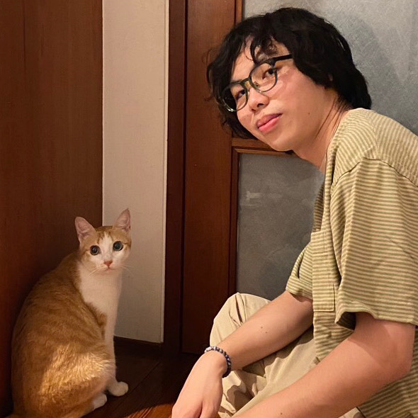 Yu-Hsuan Sun with his cat