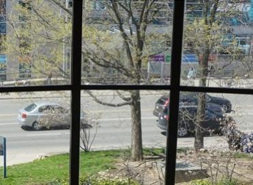 View of street through a window in the sociology department